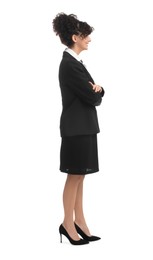 Young businesswoman in suit standing on white background