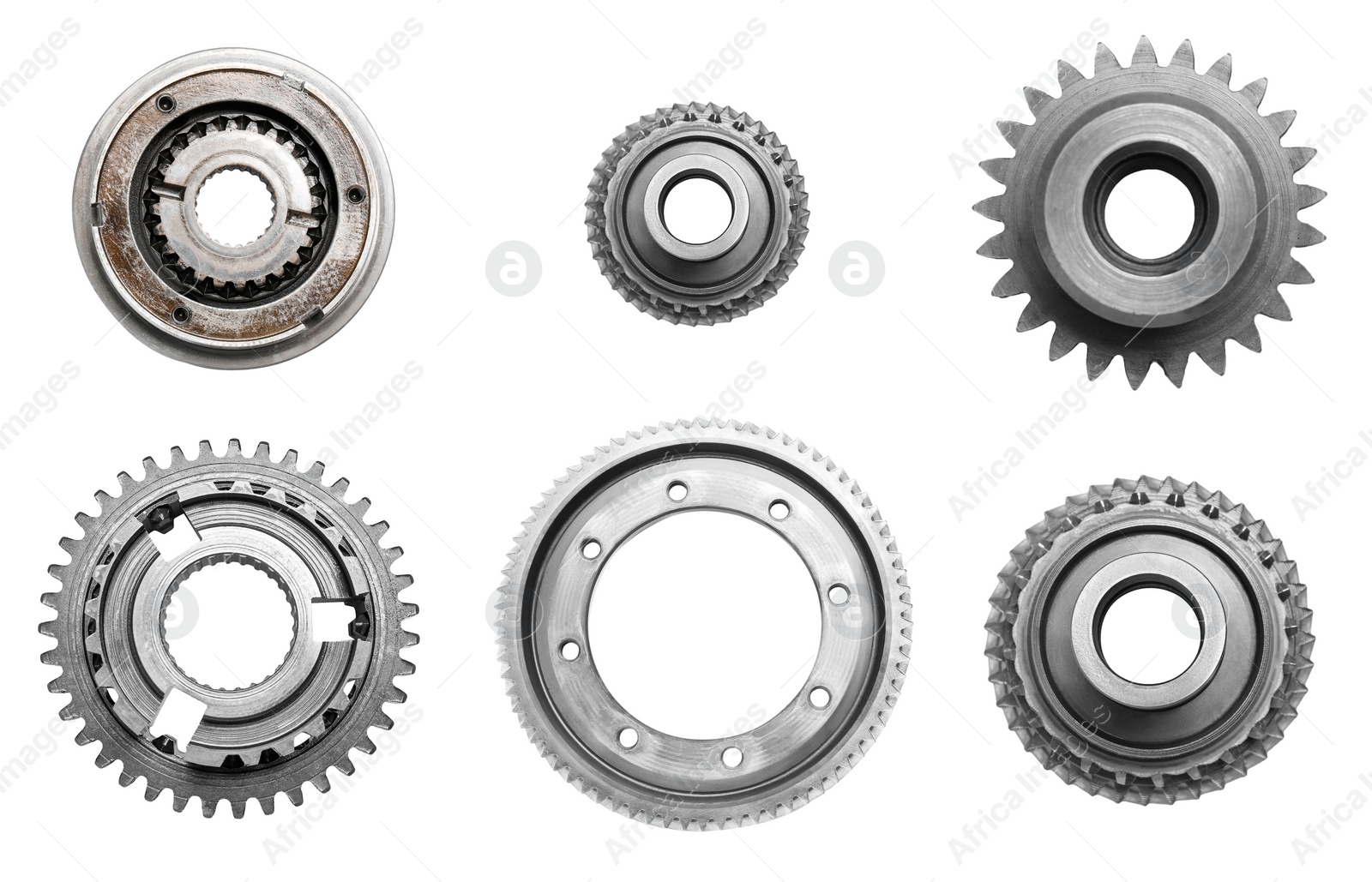 Image of Set with different stainless steel gears on white background, top view