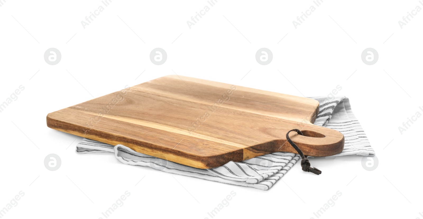 Photo of Wooden cutting board with kitchen towel isolated on white. Cooking utensil