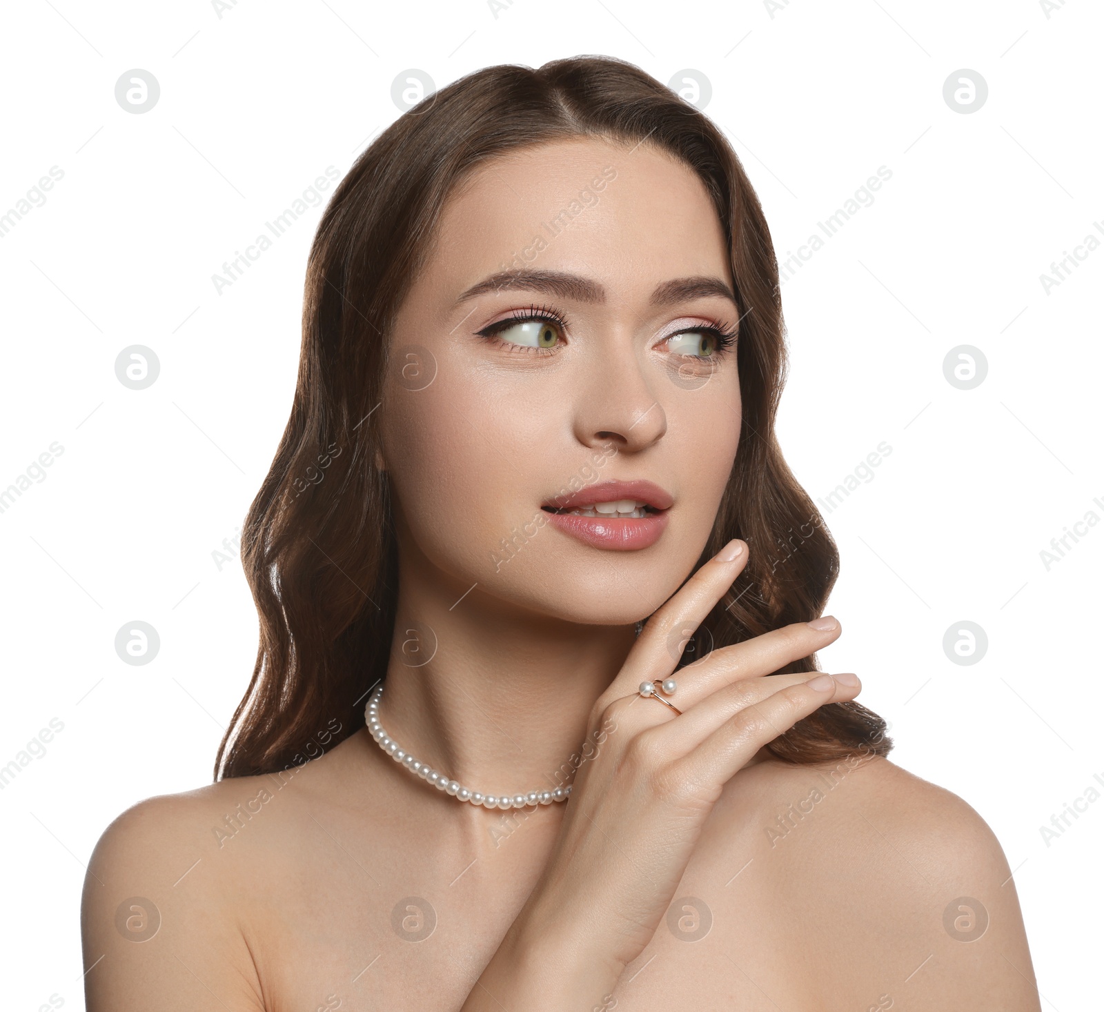 Photo of Young woman with elegant pearl jewelry on white background