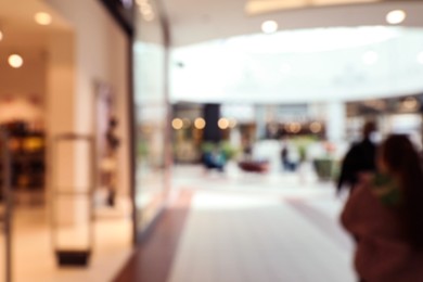 Photo of Blurred view of shopping mall interior. Bokeh effect