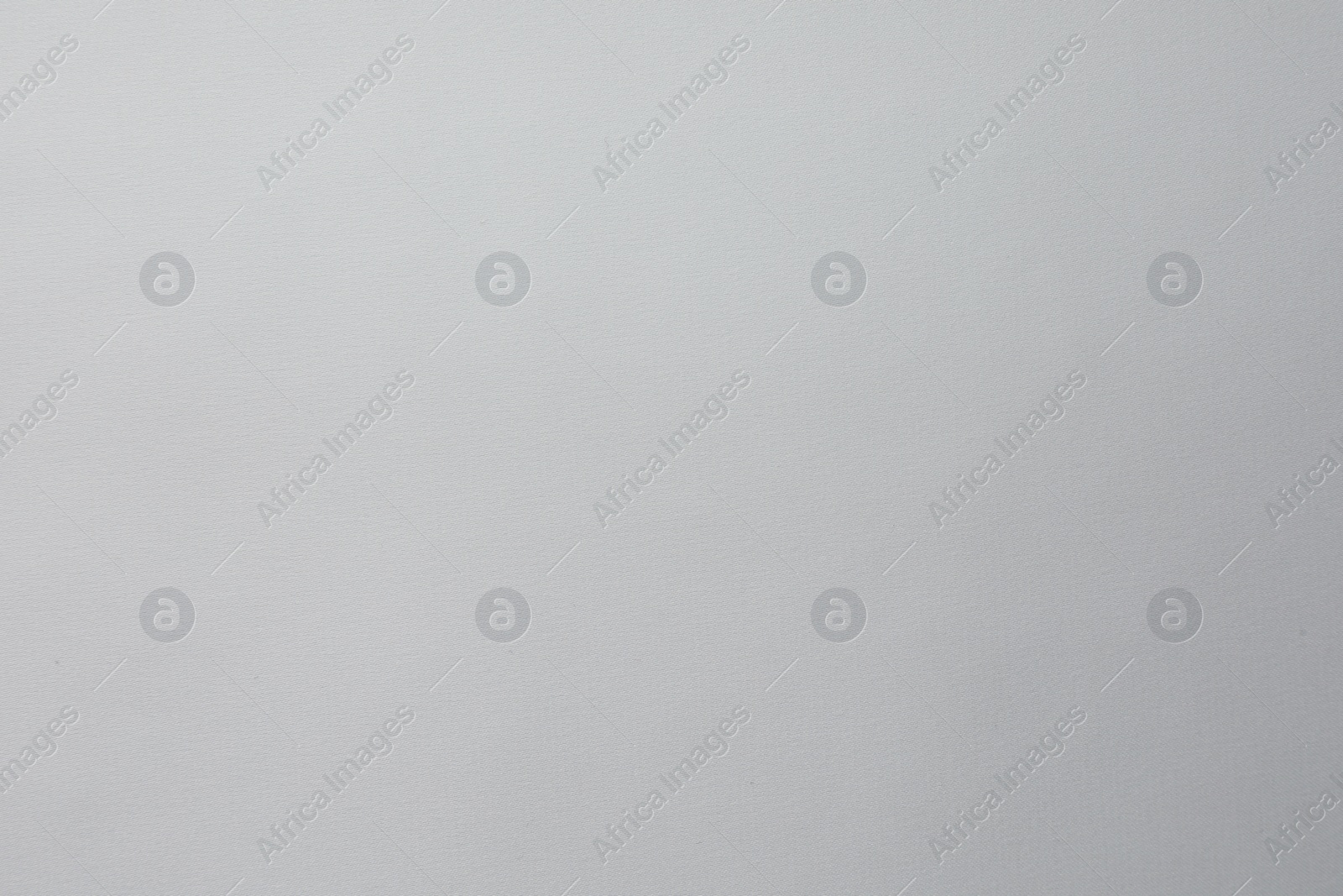 Photo of Texture of white silk fabric as background, top view