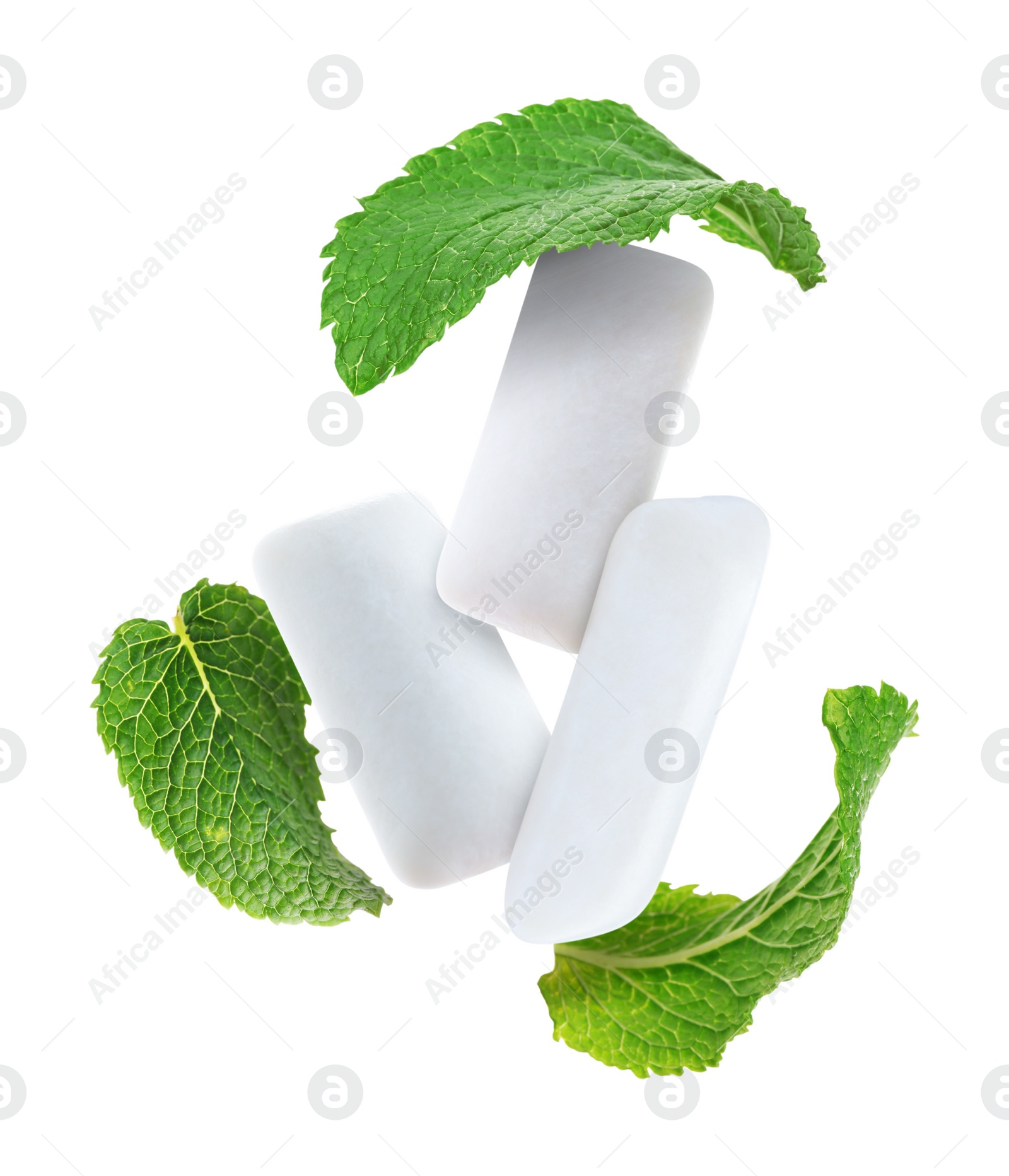 Image of Fresh mint leaves and chewing gum pads flying on white background