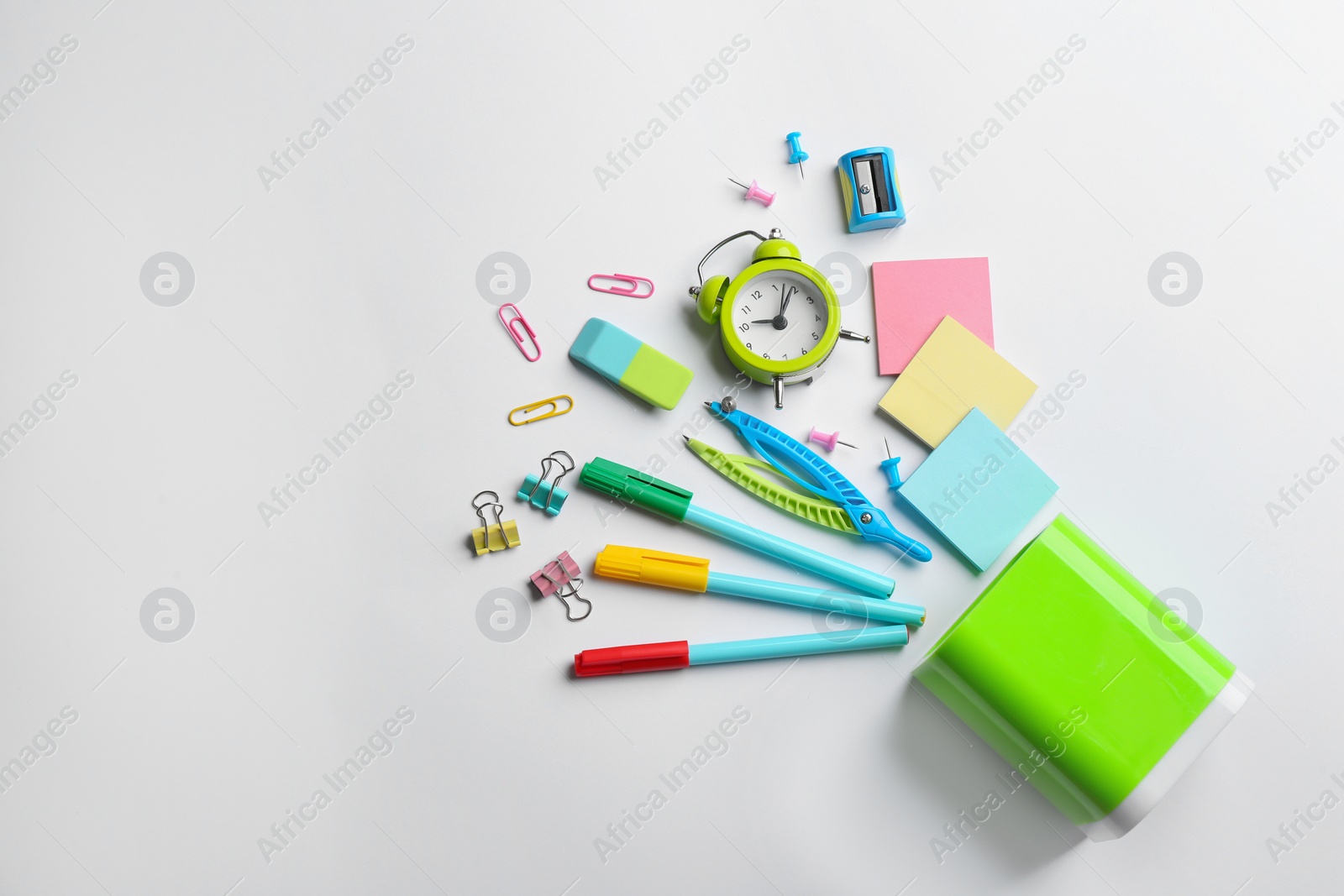 Photo of Flat lay composition with school stationery on white background, space for text. Back to school