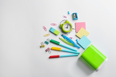 Photo of Flat lay composition with school stationery on white background, space for text. Back to school