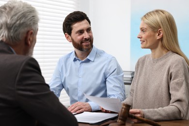 Couple having meeting with lawyer in office