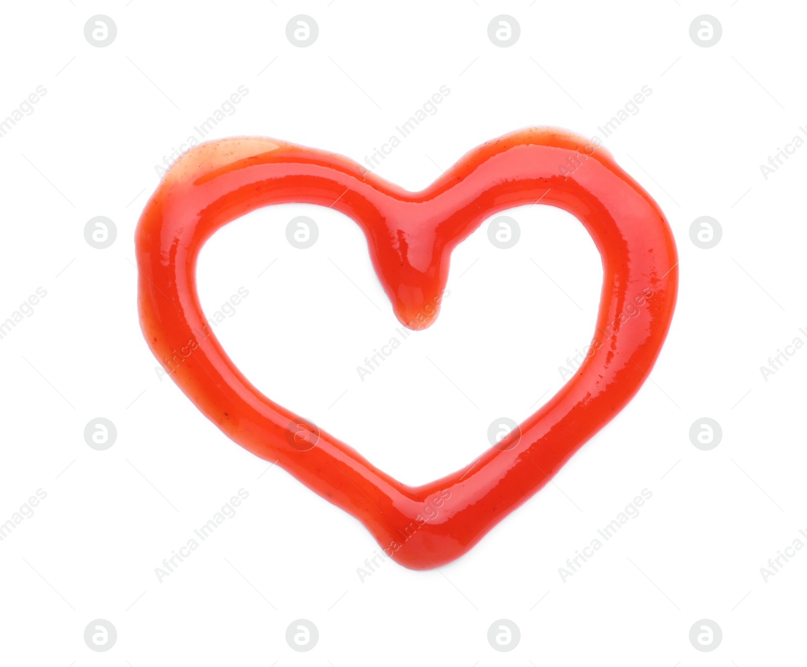 Heart made of tasty ketchup isolated on white, top view Photo of Heart made of tasty ketchup isolated on white, top view