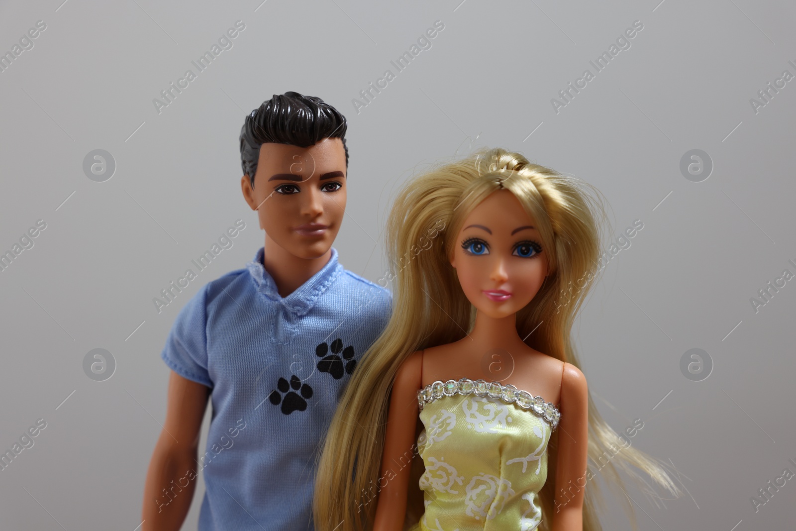 Photo of Leiden, Netherlands - September 20, 2023: Stylish Barbie and Ken dolls on light gray background