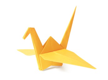 Photo of Origami art. Beautiful orange paper crane isolated on white
