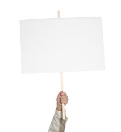 Woman holding blank protest sign on white background, closeup