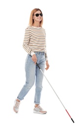 Photo of Blind person with long cane walking on white background