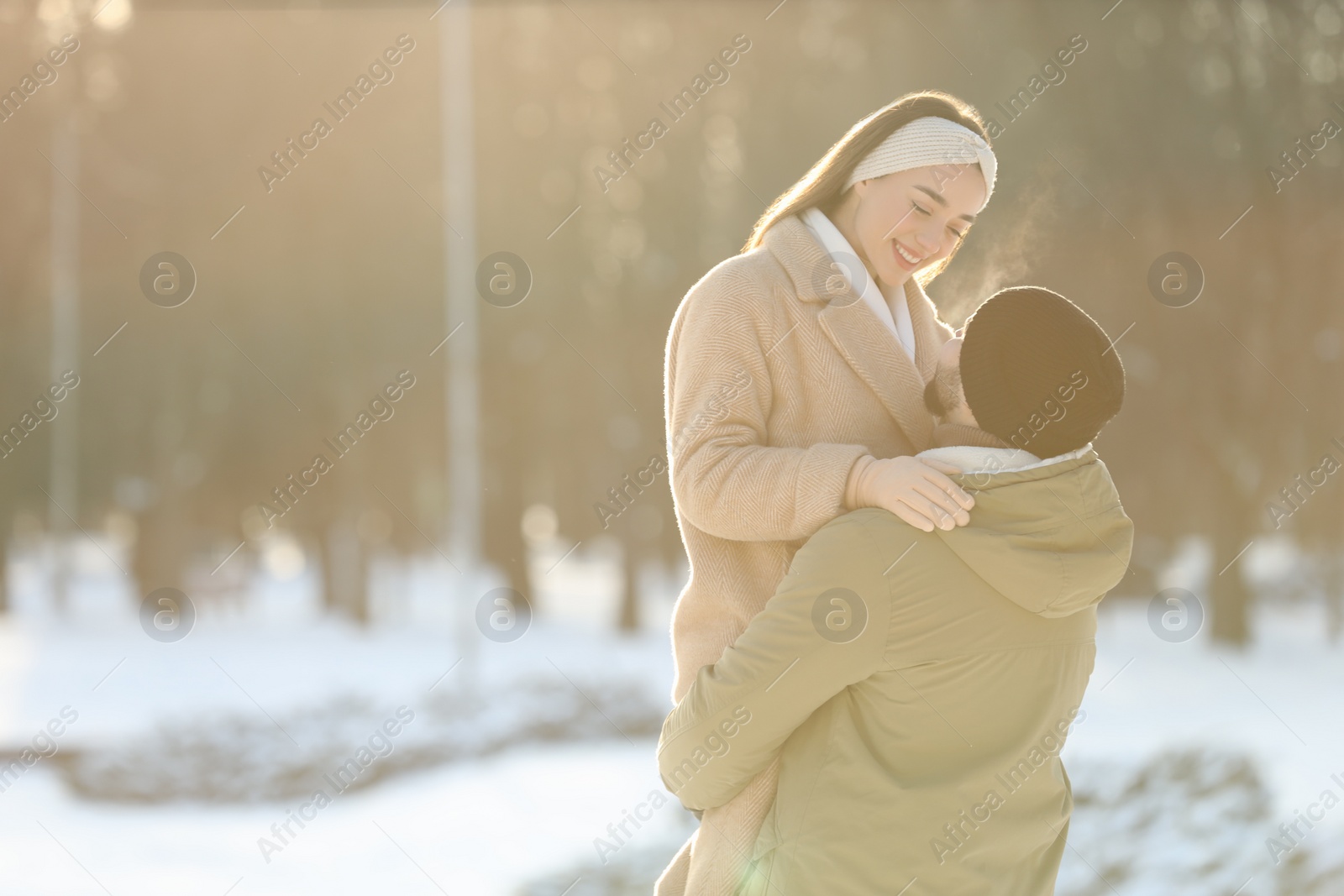 Photo of Beautiful young couple enjoying winter day outdoors