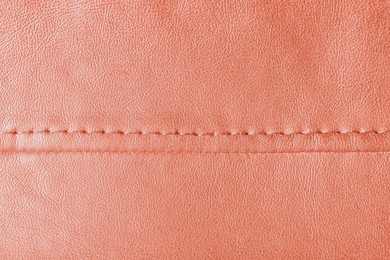 Texture of rose gold leather as background, closeup
