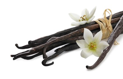 Photo of Vanilla pods, and flowers isolated on white