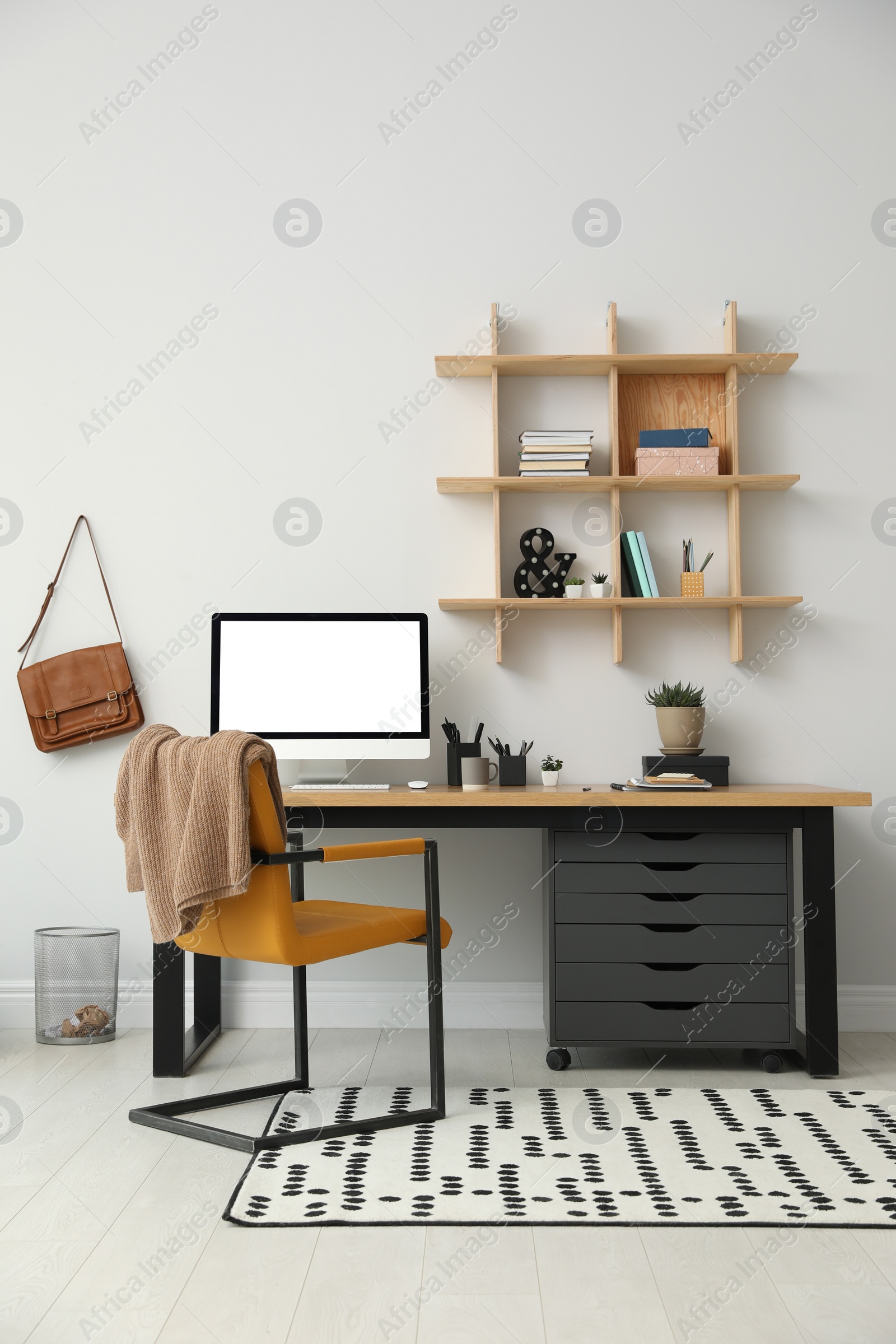 Photo of Stylish room interior with modern comfortable workplace