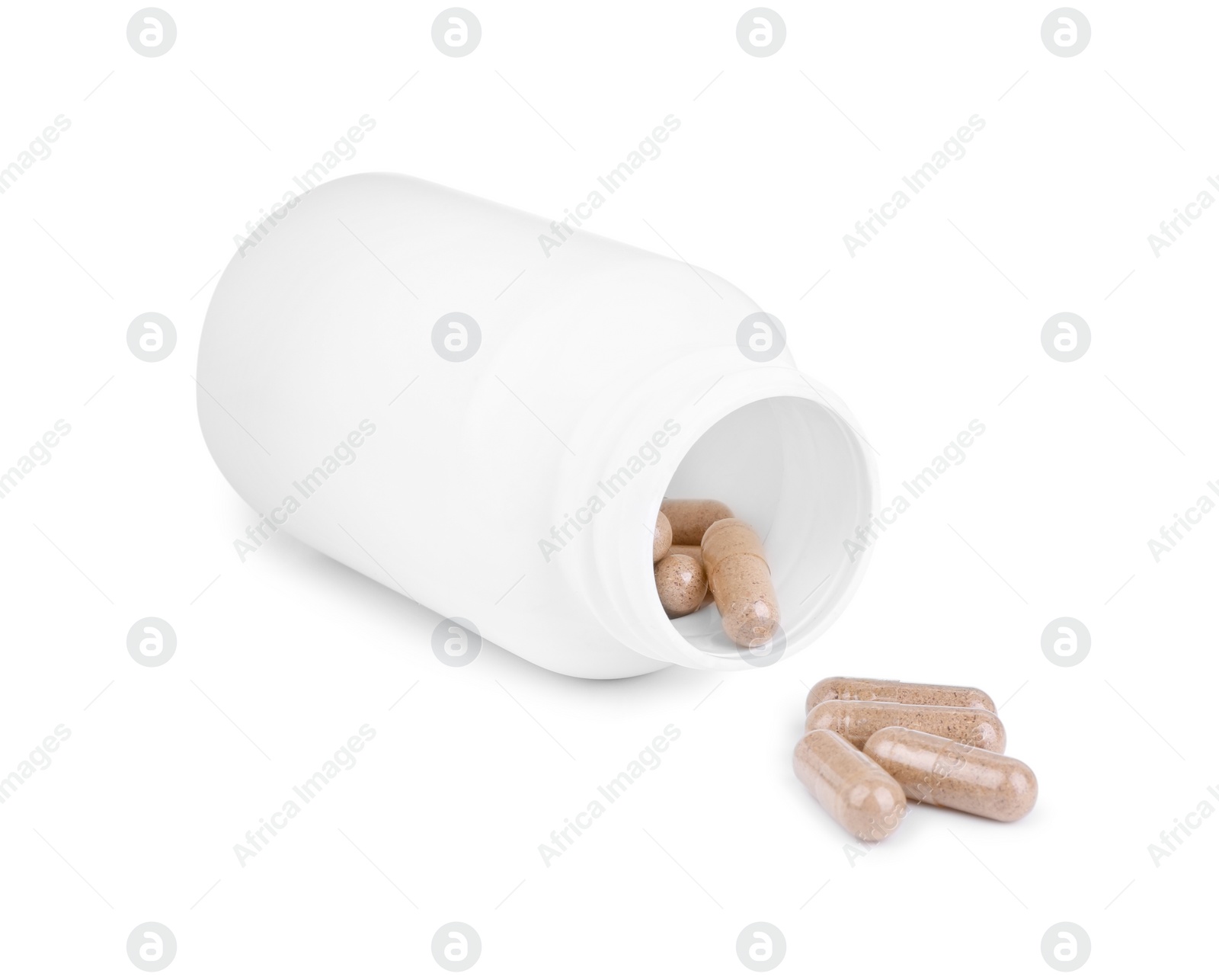 Photo of Vitamin capsules and medical bottle isolated on white