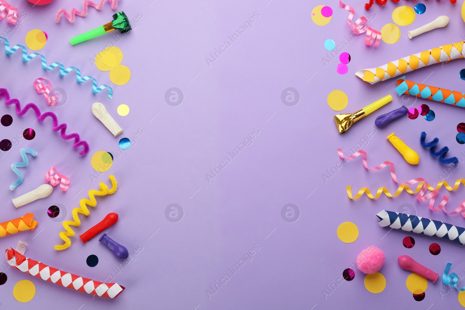 Photo of Flat lay composition with carnival items on violet background. Space for text