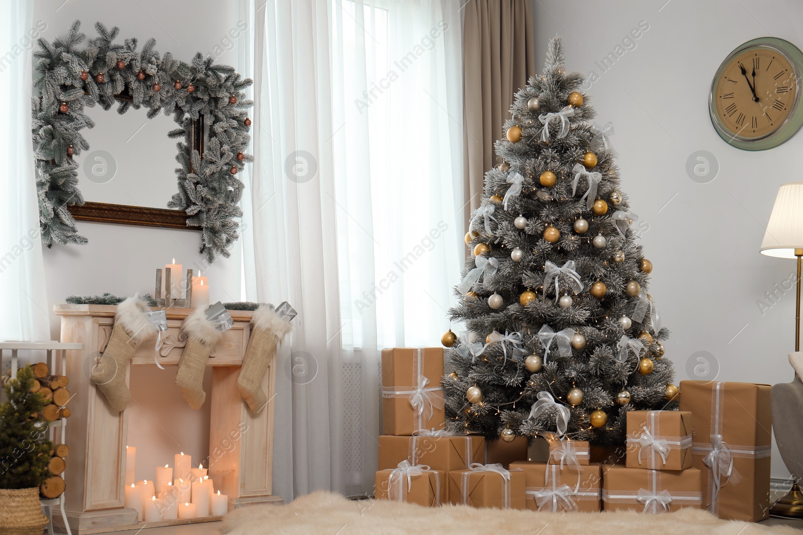 Photo of Decorated Christmas tree in modern living room interior