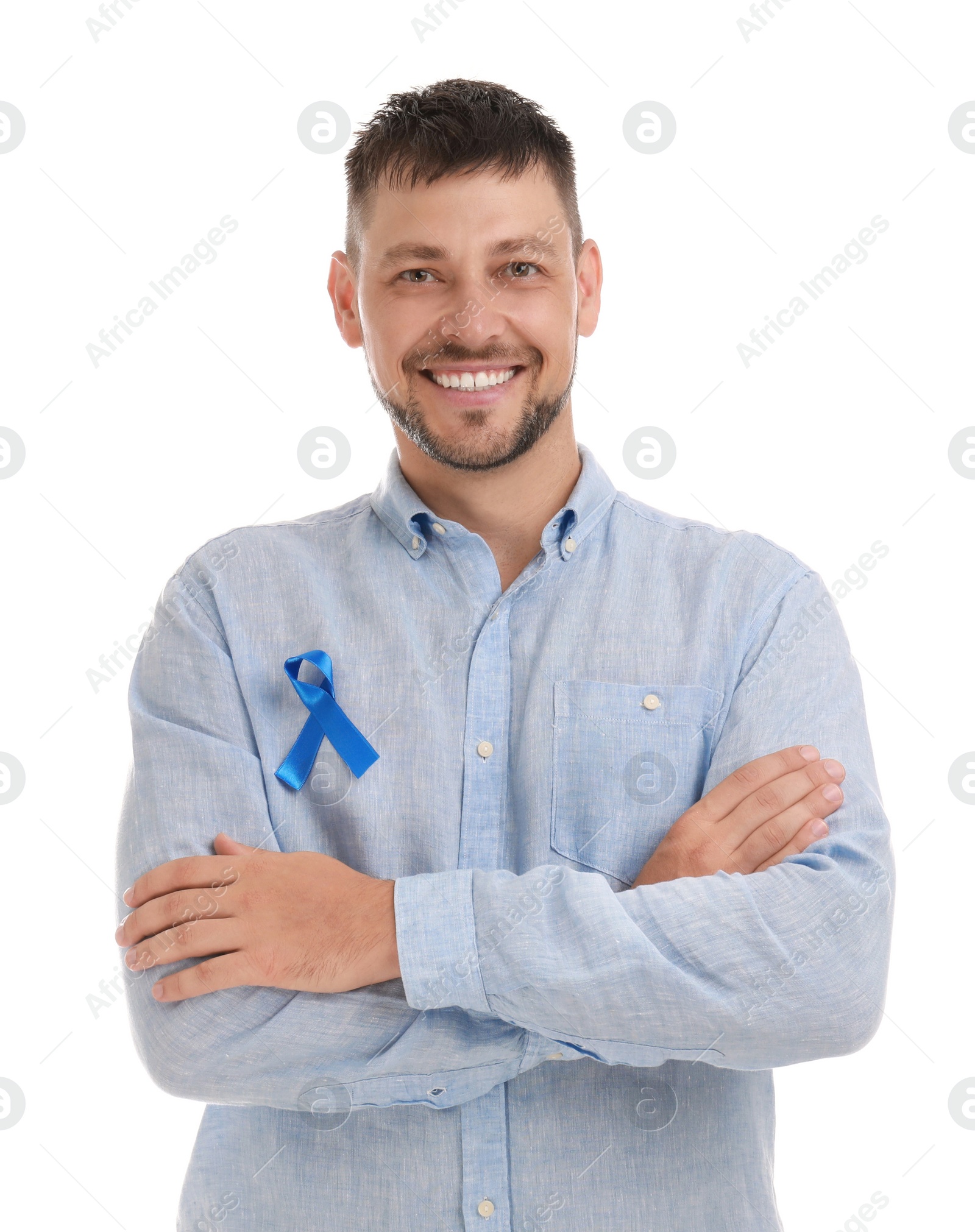 Photo of Man with blue ribbon on white background. Urology cancer awareness