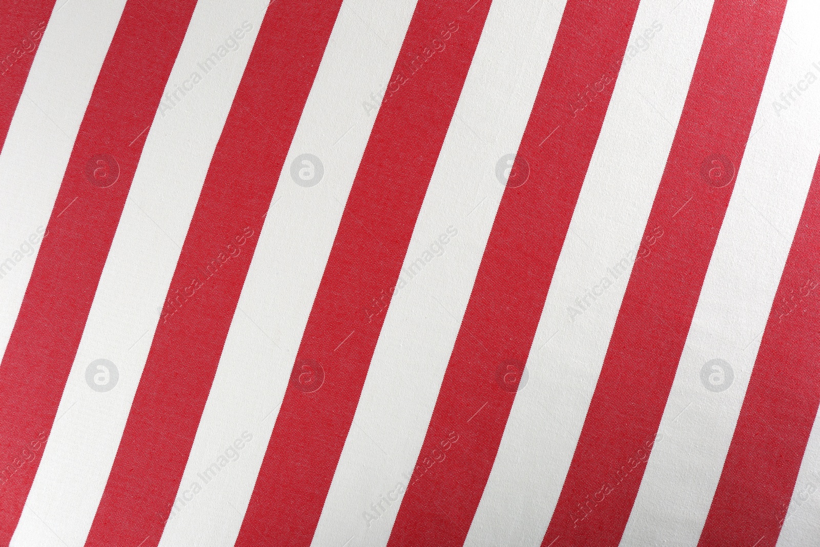 Photo of Striped beach towel as background, top view