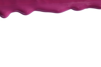 Photo of Purple nail polish flowing on white background