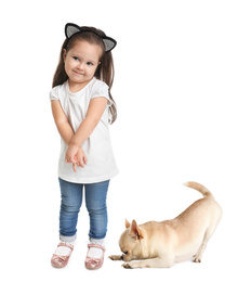 Image of Cute little girl with her pet on white background