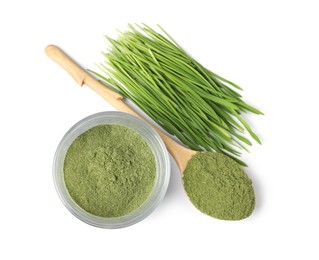 Photo of Wheat grass powder and fresh sprouts isolated on white, top view