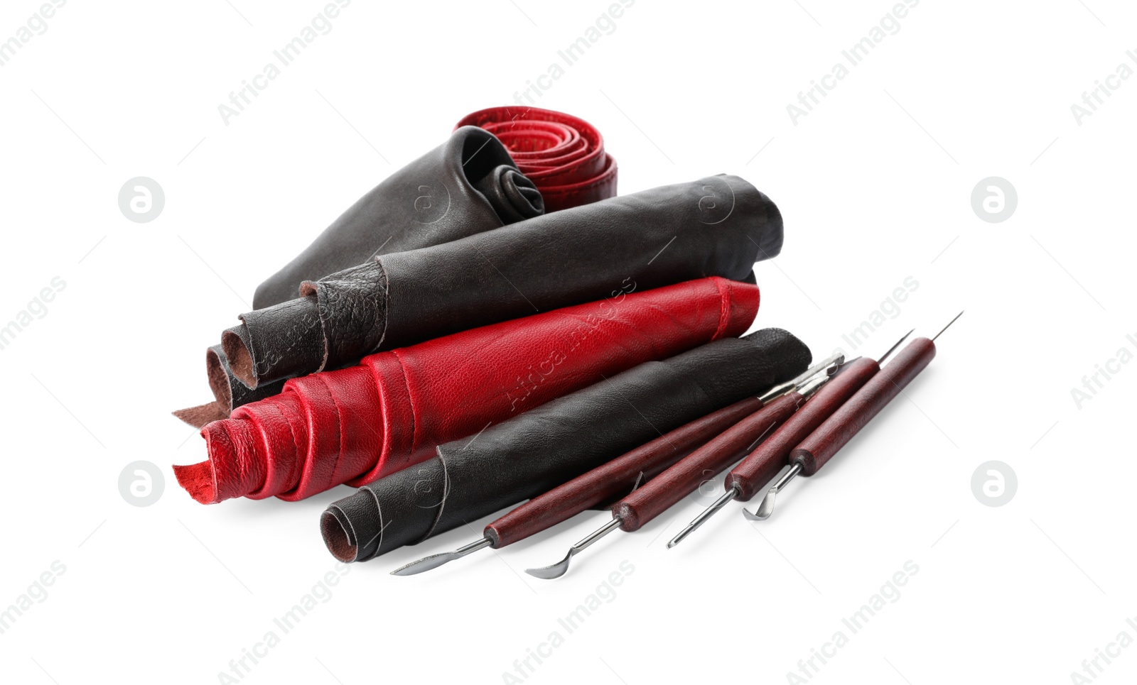 Photo of Leather samples and craftsman tools isolated on white