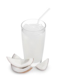 Glass of coconut water, ice cubes and nut isolated on white