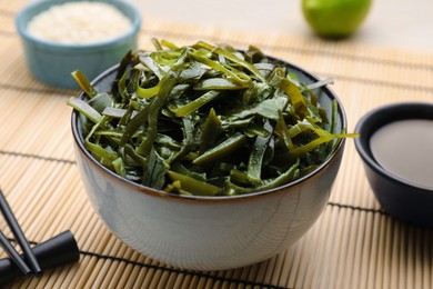 Fresh laminaria (kelp) seaweed served on table