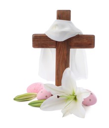 Photo of Wooden cross, cloth, painted Easter eggs and lily flowers on white background