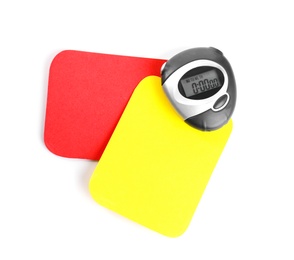 Photo of Stopwatch, red and yellow cards on white background, top view. Football rules