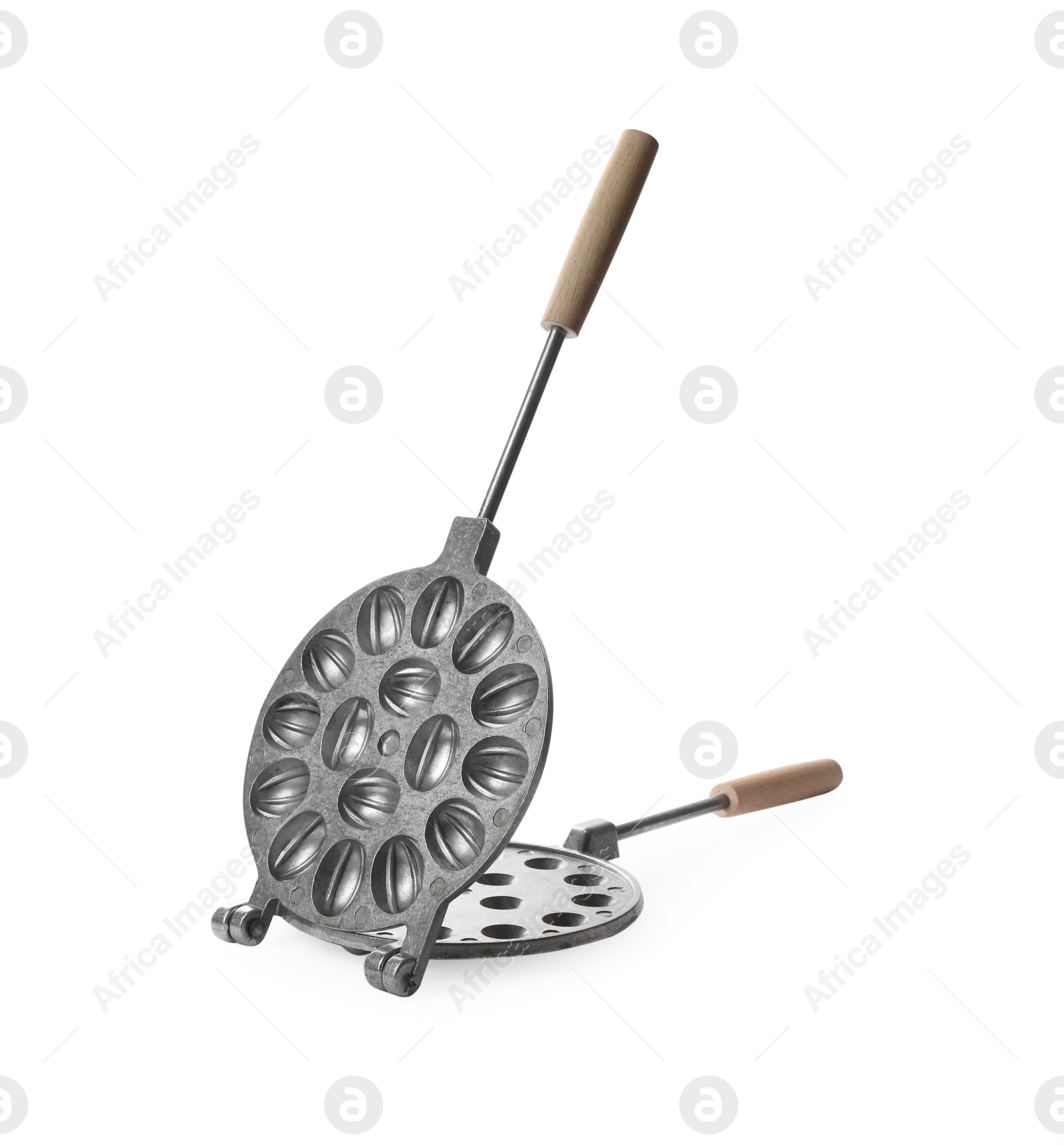 Photo of Walnut cookie mold with wooden handle isolated on white