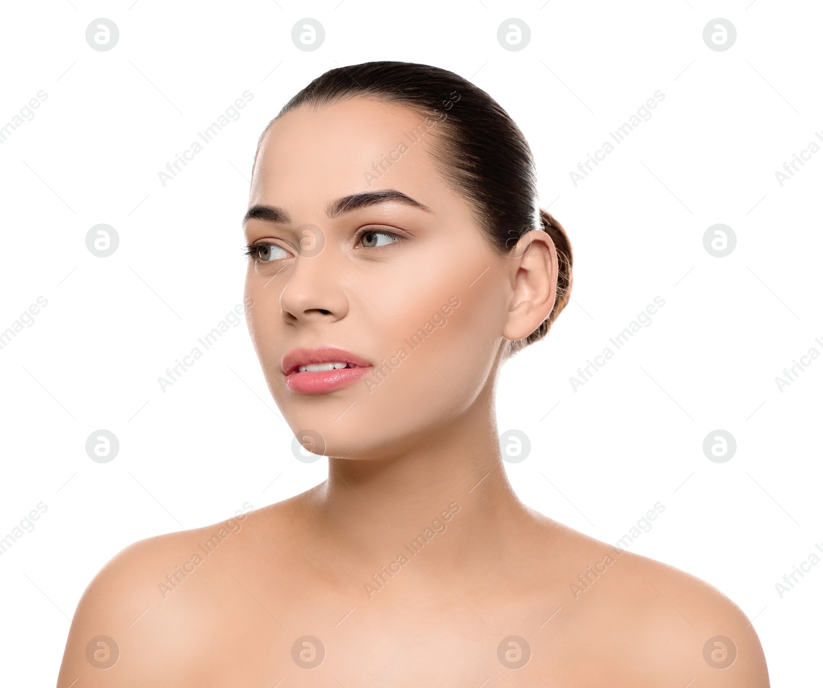 Photo of Portrait of young woman with beautiful face and natural makeup on white background