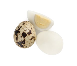 Photo of Unpeeled and peeled hard boiled quail eggs on white background, top view