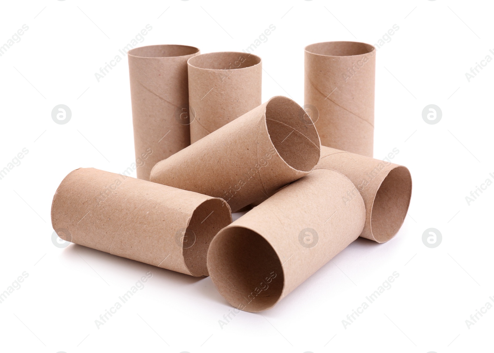 Photo of Empty paper toilet rolls on white background