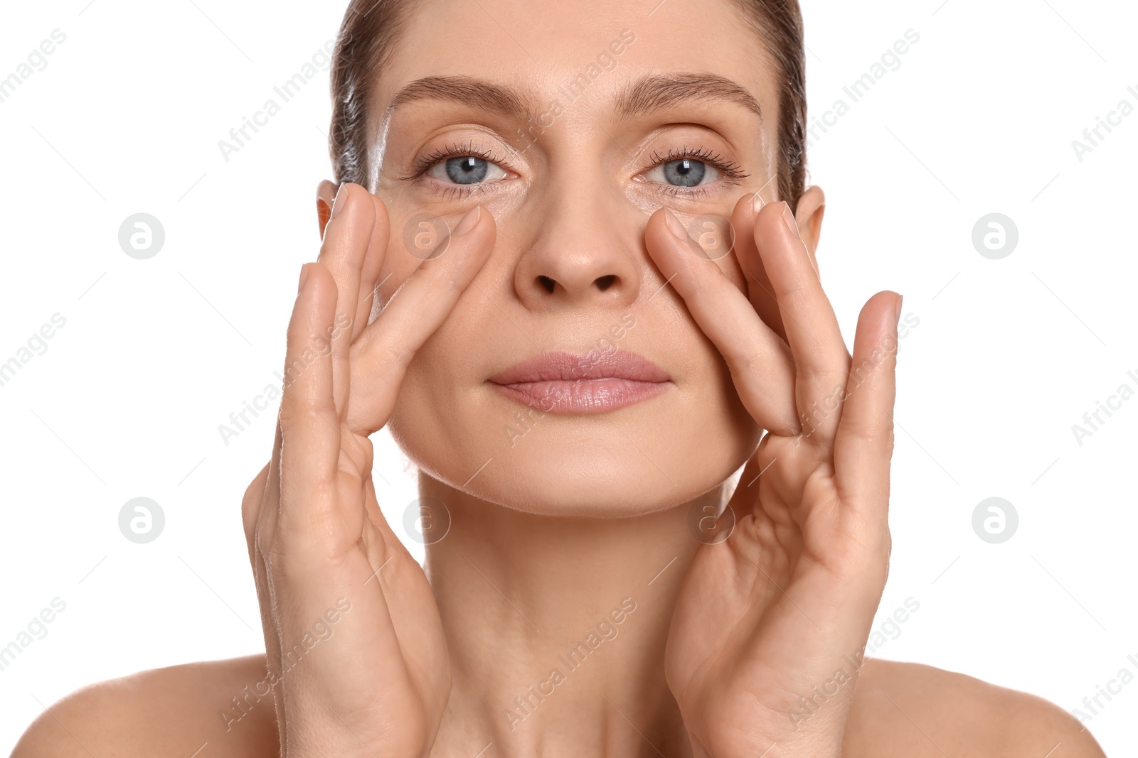 Photo of Woman massaging her face on white background