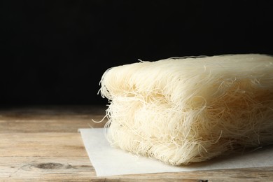 Block of rice noodles on wooden table, closeup
