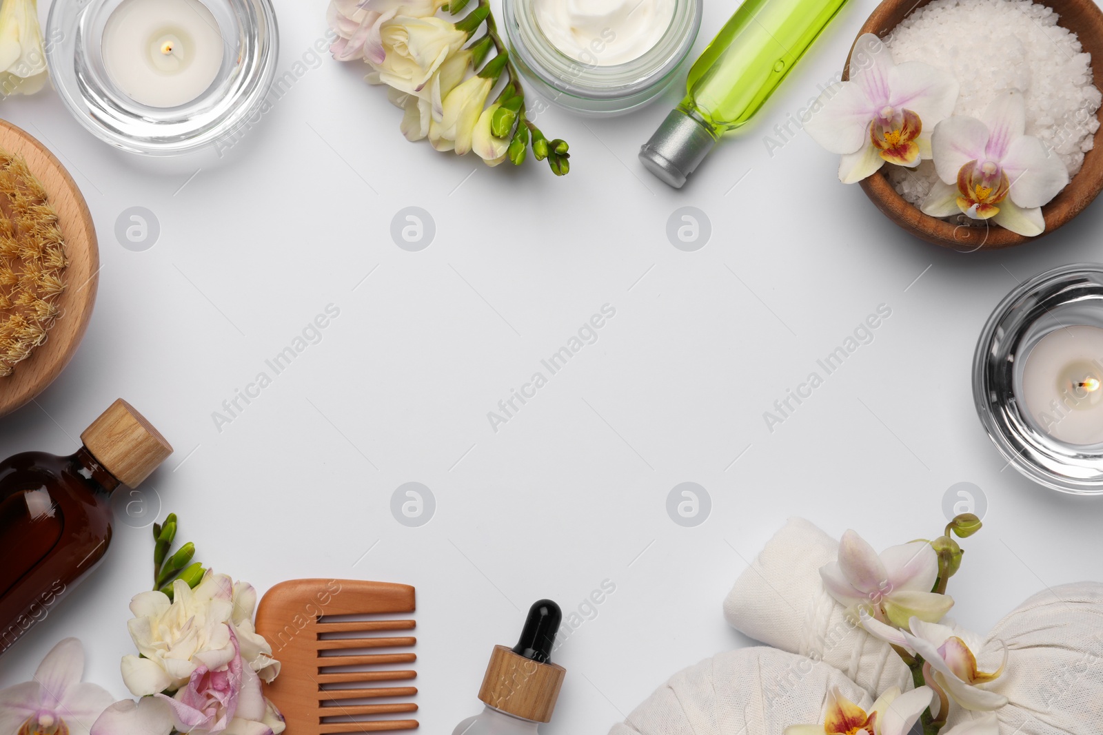 Photo of Flat lay composition with different spa products on white background. Space for text