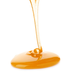 Photo of Pouring sweet fresh honey isolated on white