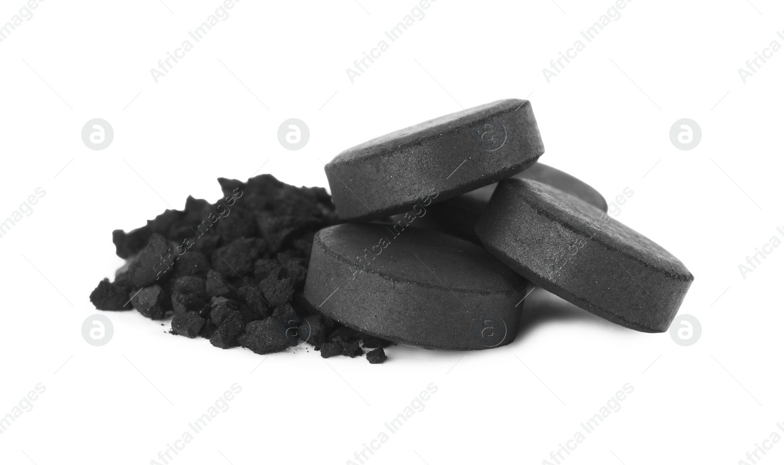 Photo of Activated charcoal on white background. Potent sorbent