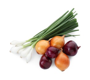 Different kinds of onions isolated on white, top view