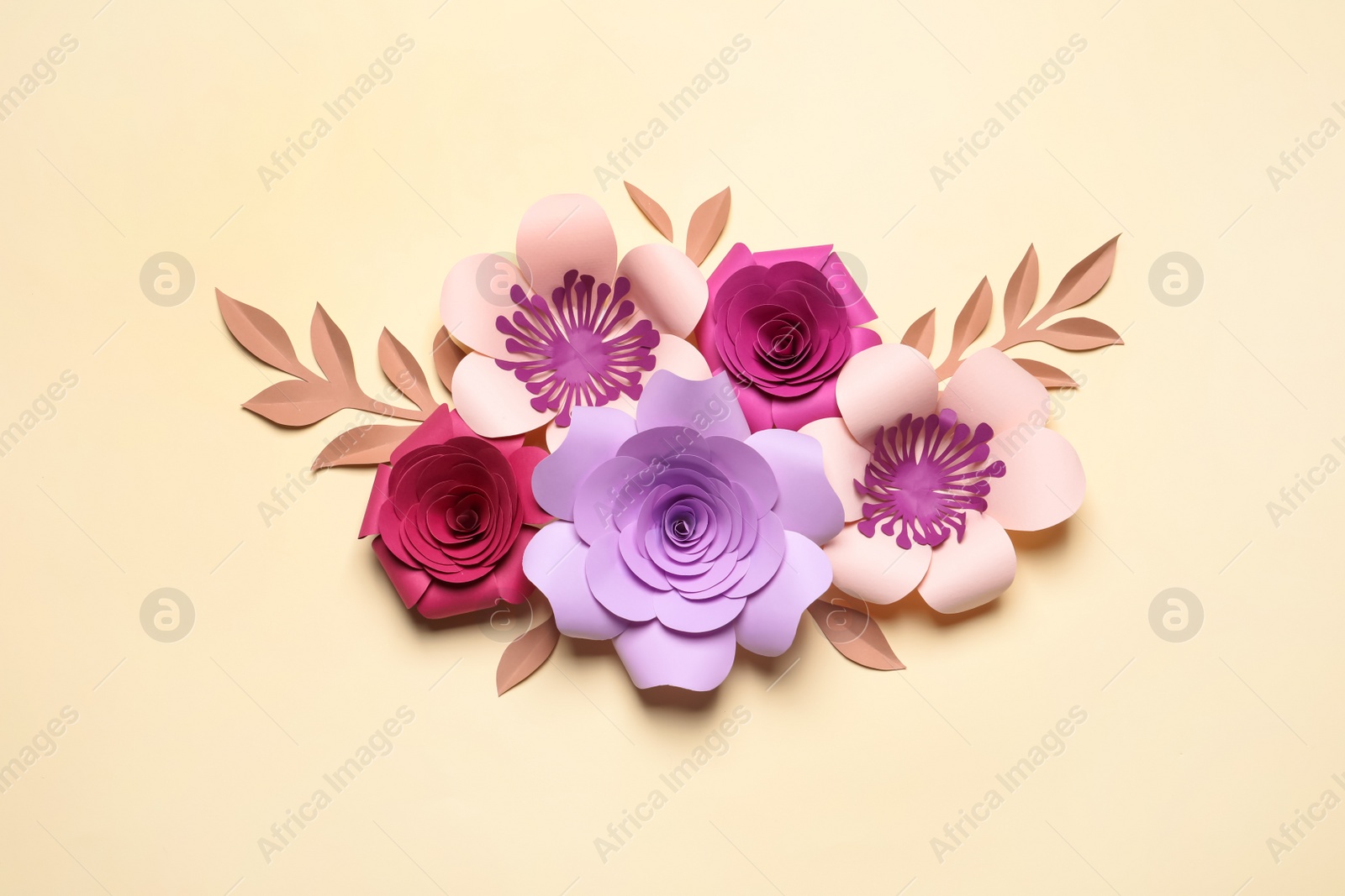 Photo of Different beautiful flowers and branches made of paper on beige background, flat lay