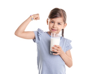 Cute little girl with glass of milk on white background