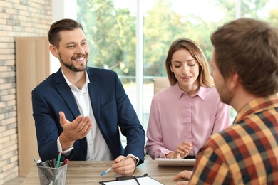 Human resources commission conducting job interview with applicant in office