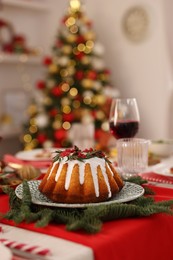 Photo of Festive dinner with delicious cake served on table indoors, space for text. Christmas Eve celebration