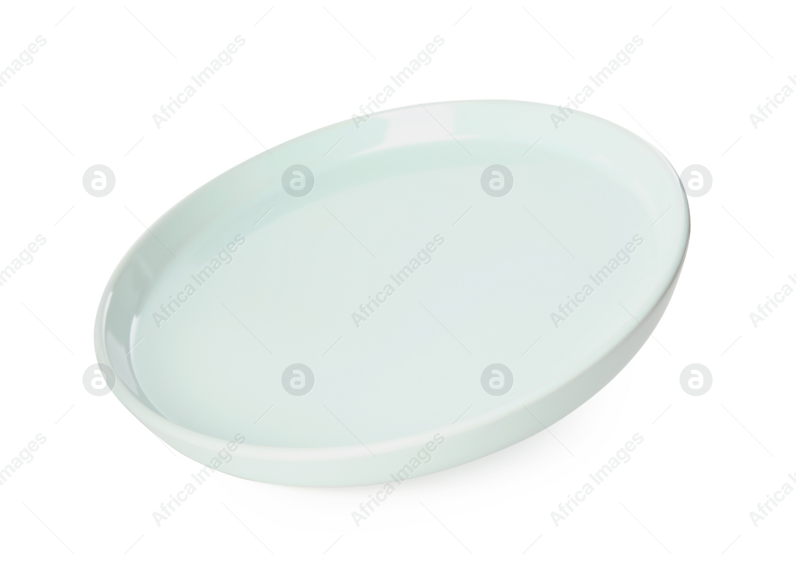 Photo of Clean light blue plate isolated on white