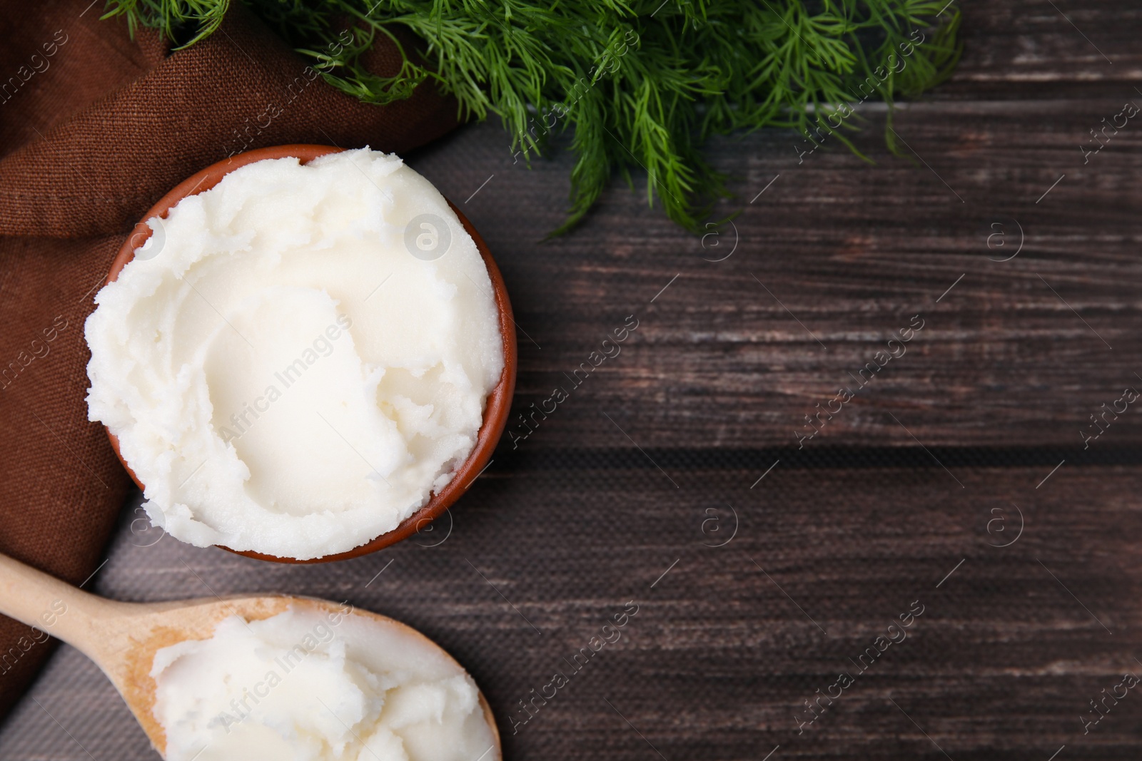 Photo of Delicious pork lard and dill on wooden table, flat lay. Space for text