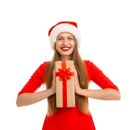 Young beautiful woman in Santa hat with gift box on white background. Christmas celebration