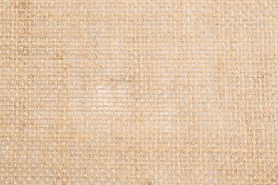 Photo of Texture of burlap fabric as background, top view